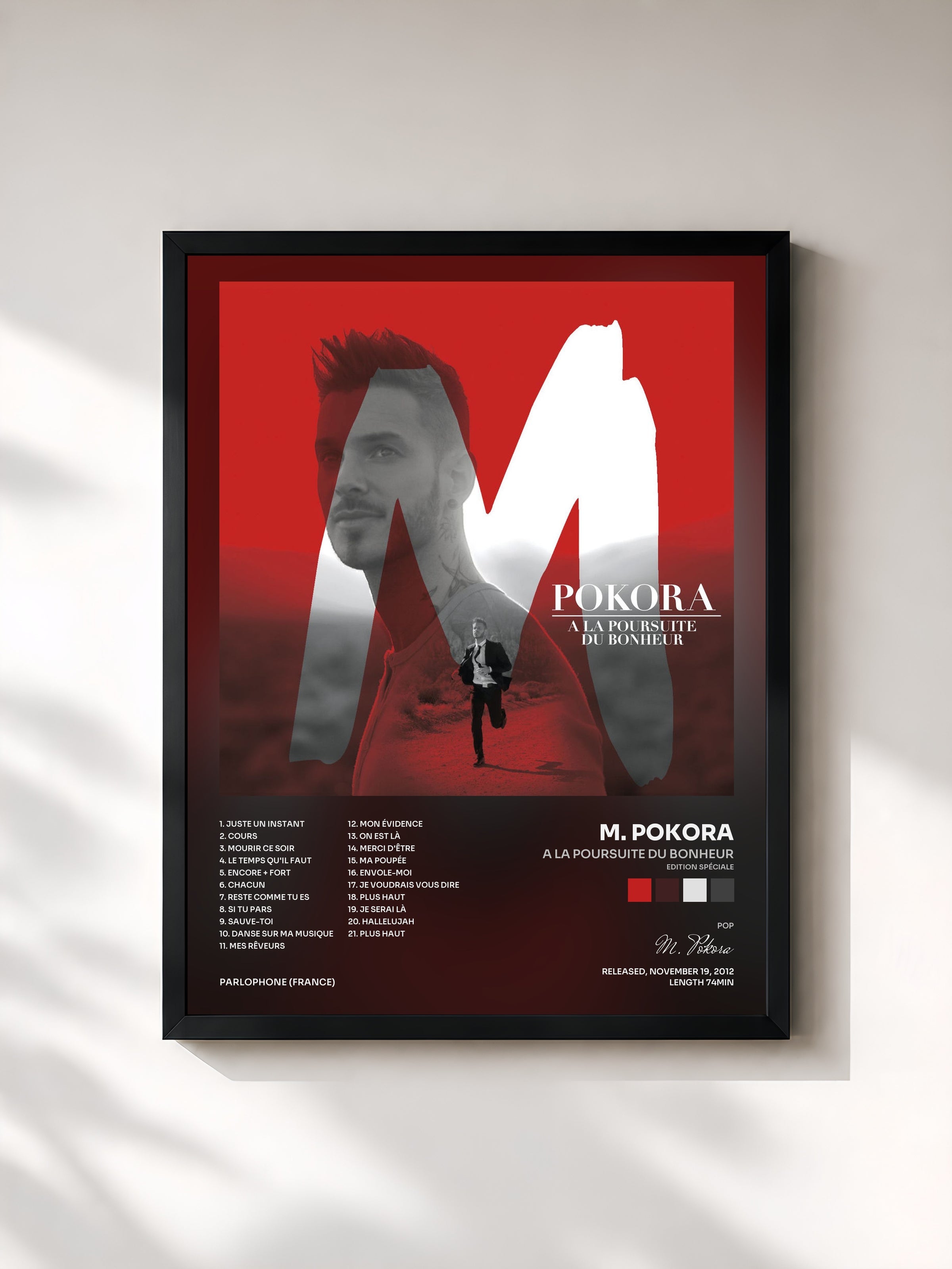 #noir A la poursuite du bonheur (Edition Spéciale) de M. Pokora en lámina enmarcada, marco negro, impresa y enmarcada en Francia