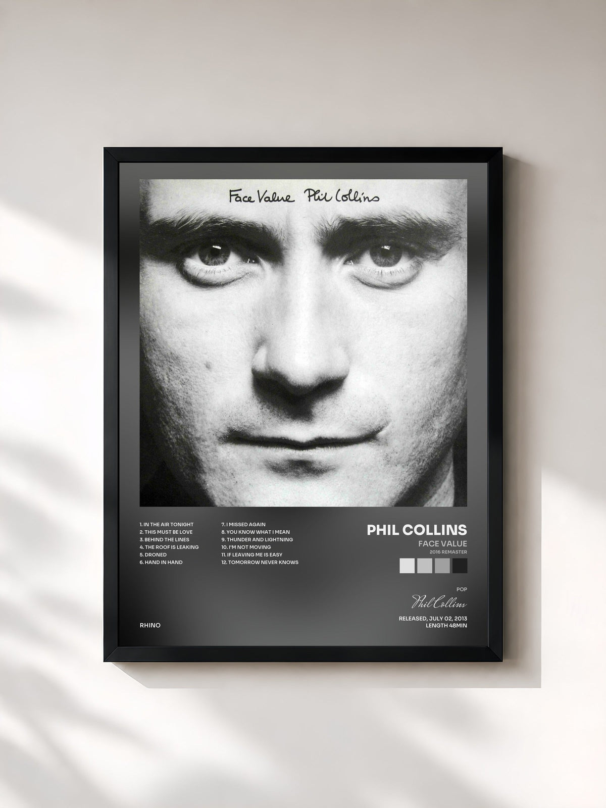 #noir Tableau de l'album Face Value (2016 Remaster) de Phil Collins, cadre noir, imprimé et encadré en France