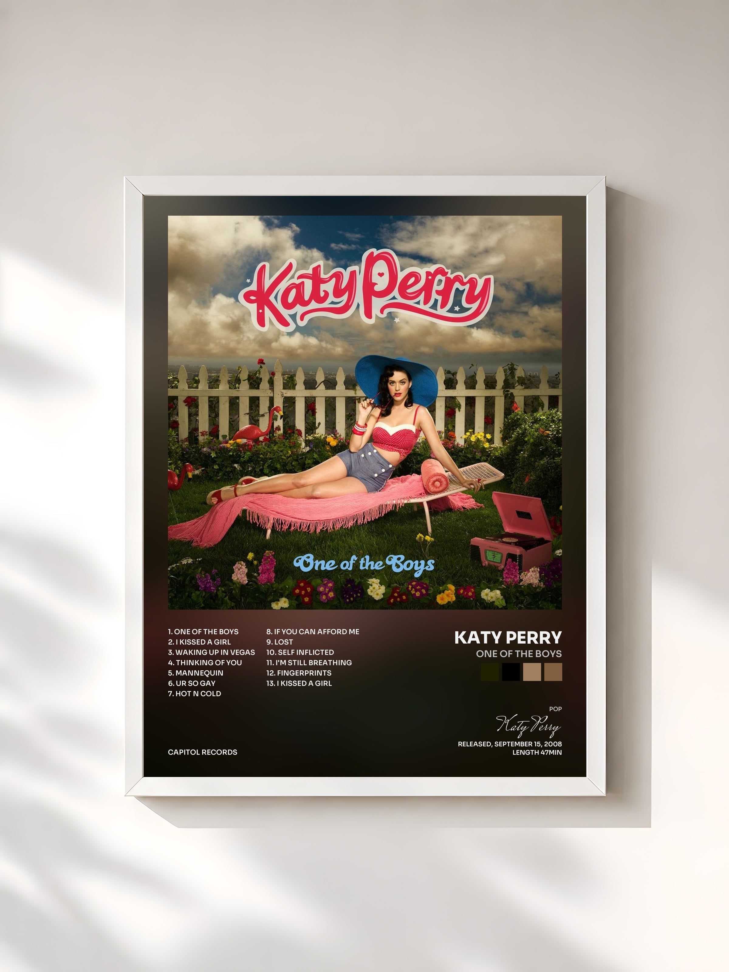 #blanc One Of The Boys by Katy Perry as a framed art print, white frame, printed and framed in France