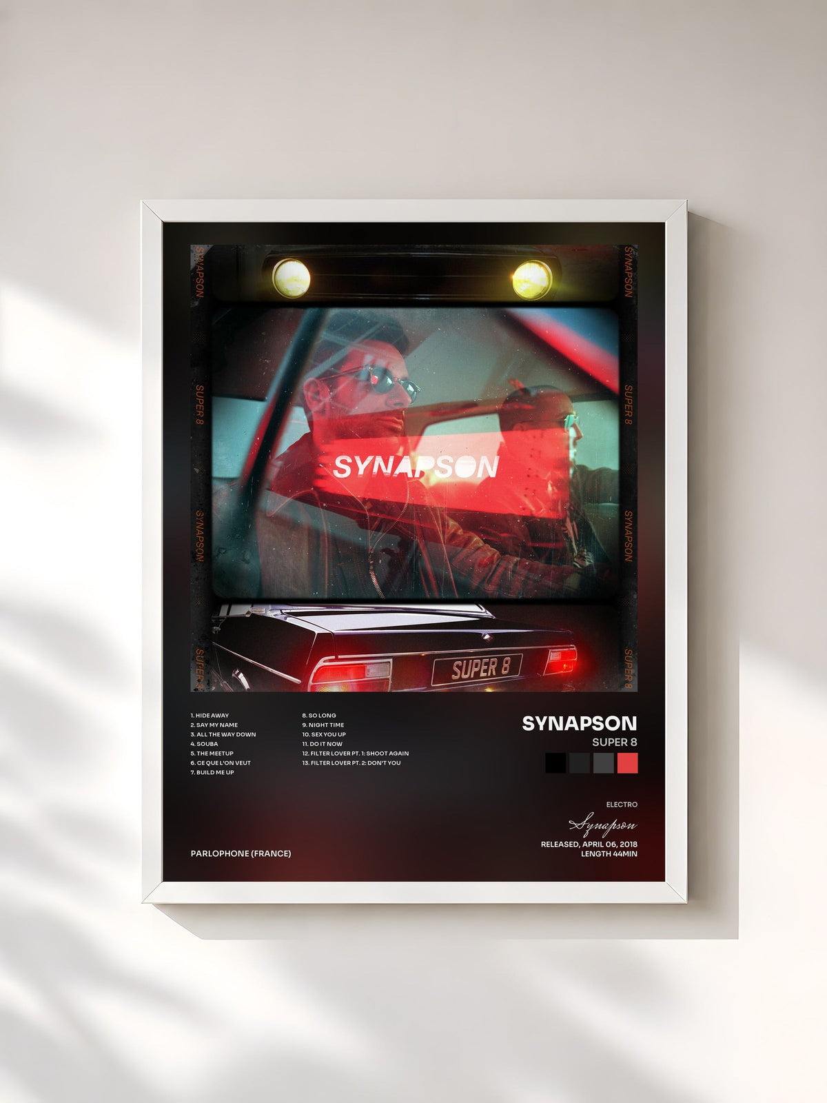 #blanc Super 8 by Synapson as a framed art print, white frame, printed and framed in France