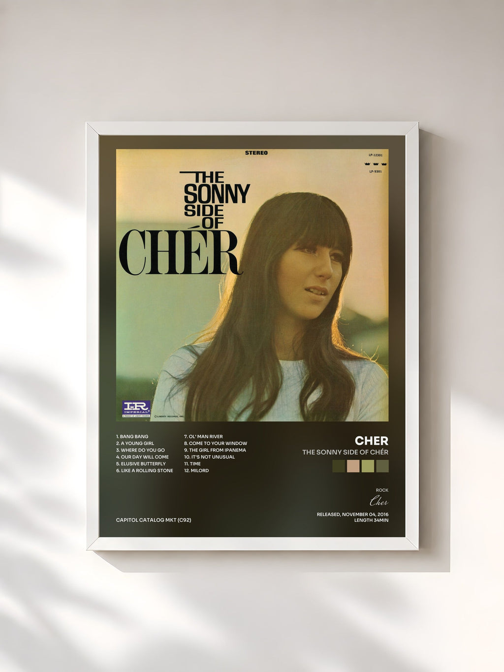 #blanc The Sonny Side Of Chér by Cher as a framed art print, white frame, printed and framed in France