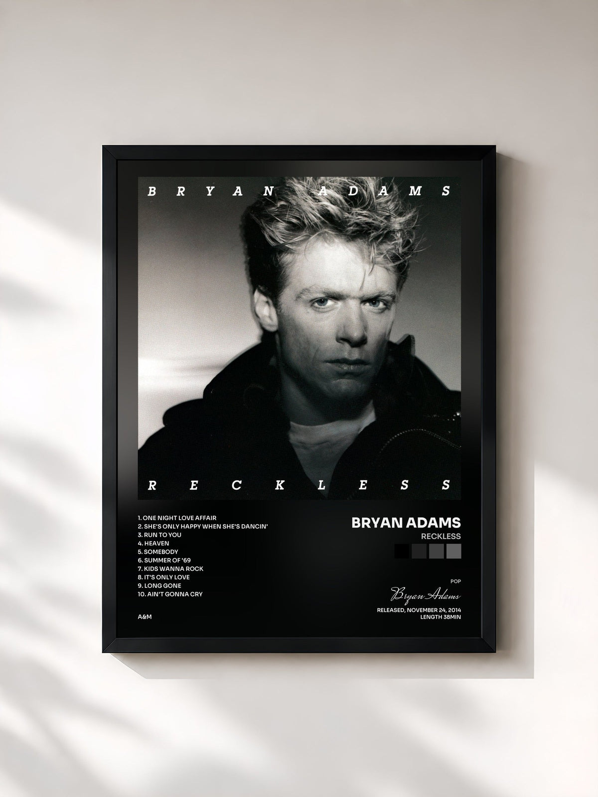 #noir Reckless de Bryan Adams en lámina enmarcada, marco negro, impresa y enmarcada en Francia
