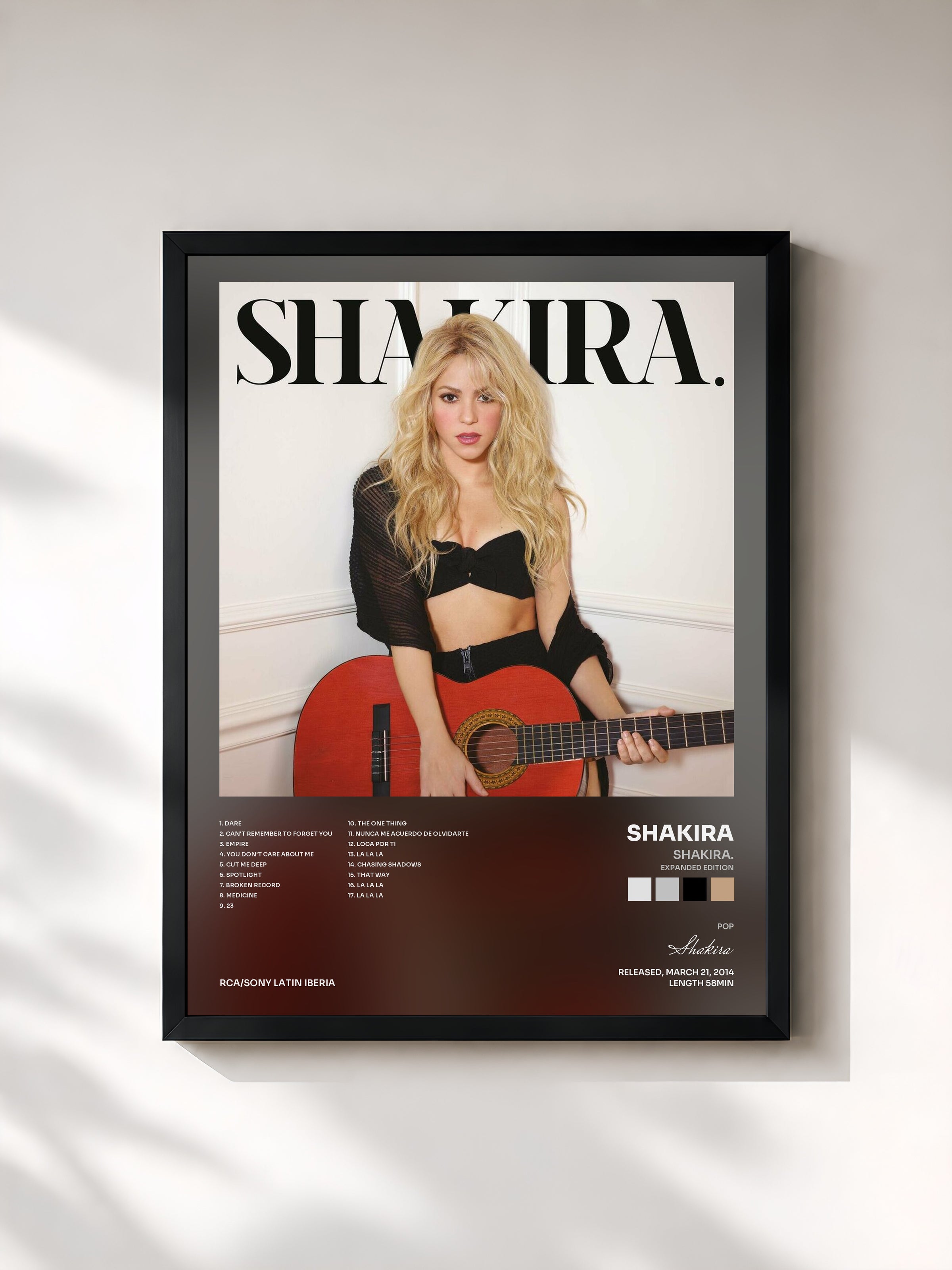 #noir Shakira. (Expanded Edition) by Shakira as a framed art print, black frame, printed and framed in France