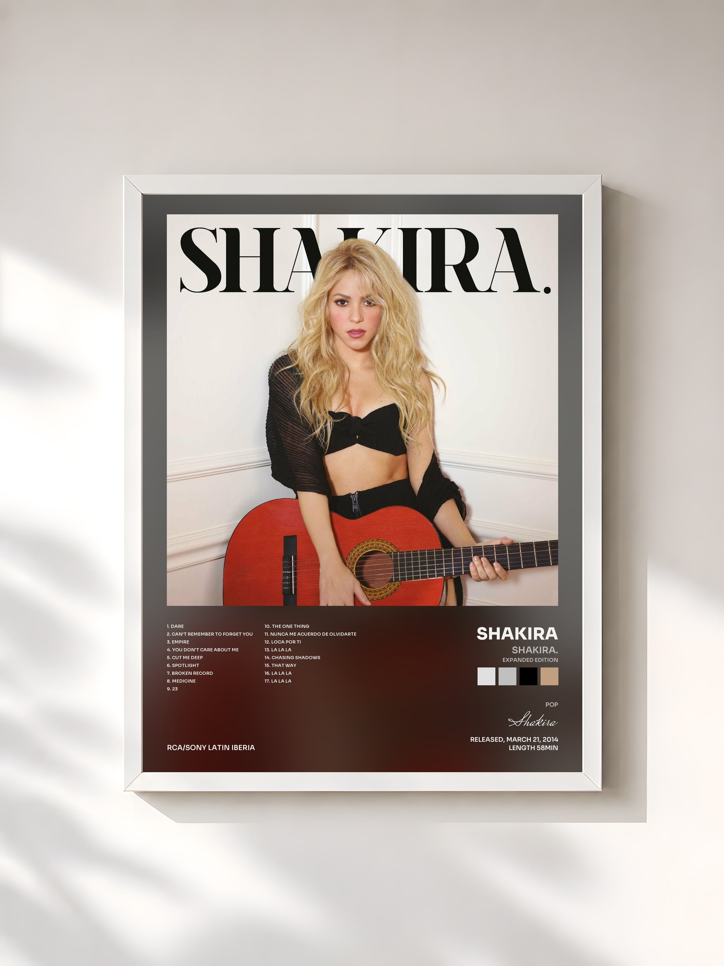 #blanc Shakira. (Expanded Edition) by Shakira as a framed art print, white frame, printed and framed in France