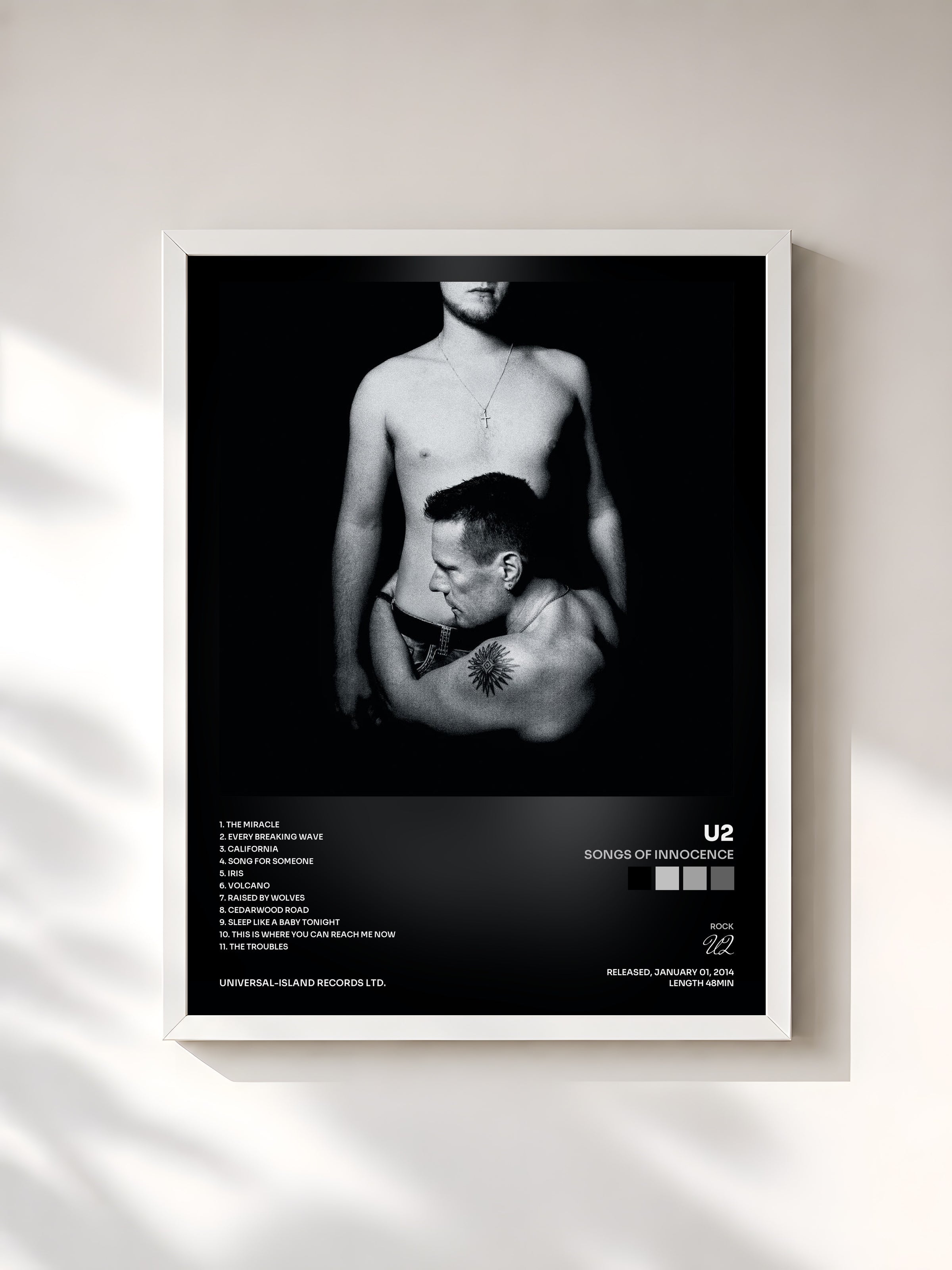 #blanc Tableau de l'album Songs Of Innocence de U2, cadre blanc, imprimé et encadré en France