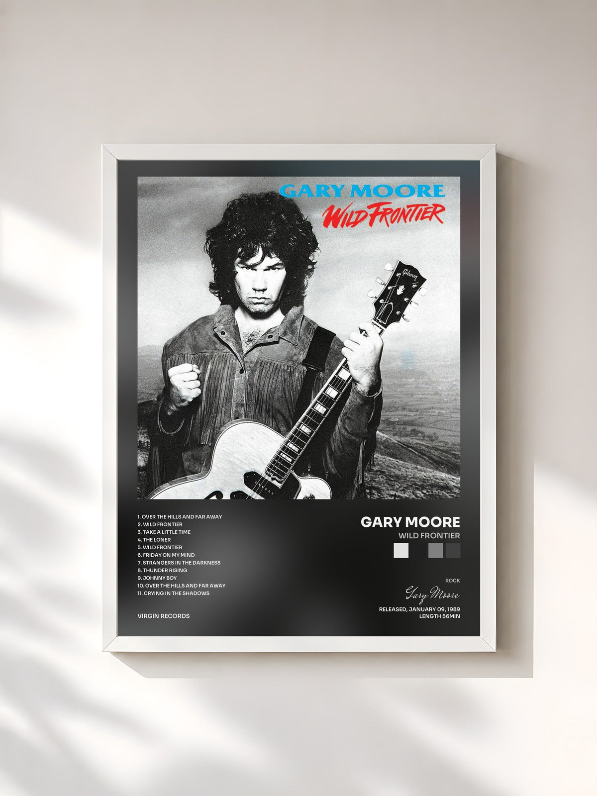 #blanc Wild Frontier by Gary Moore as a framed art print, white frame, printed and framed in France
