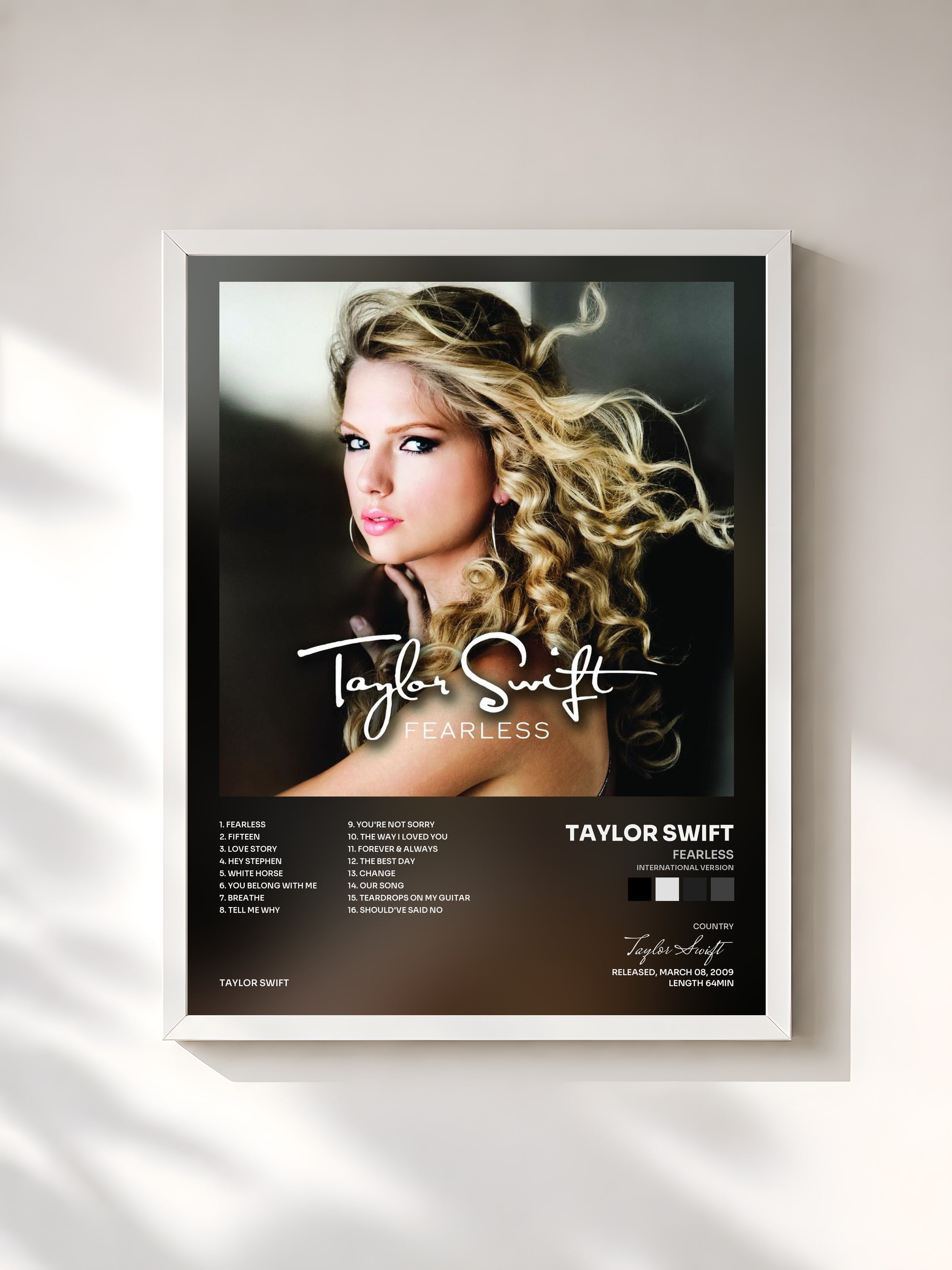 #blanc Fearless (International Version) by Taylor Swift as a framed art print, white frame, printed and framed in France