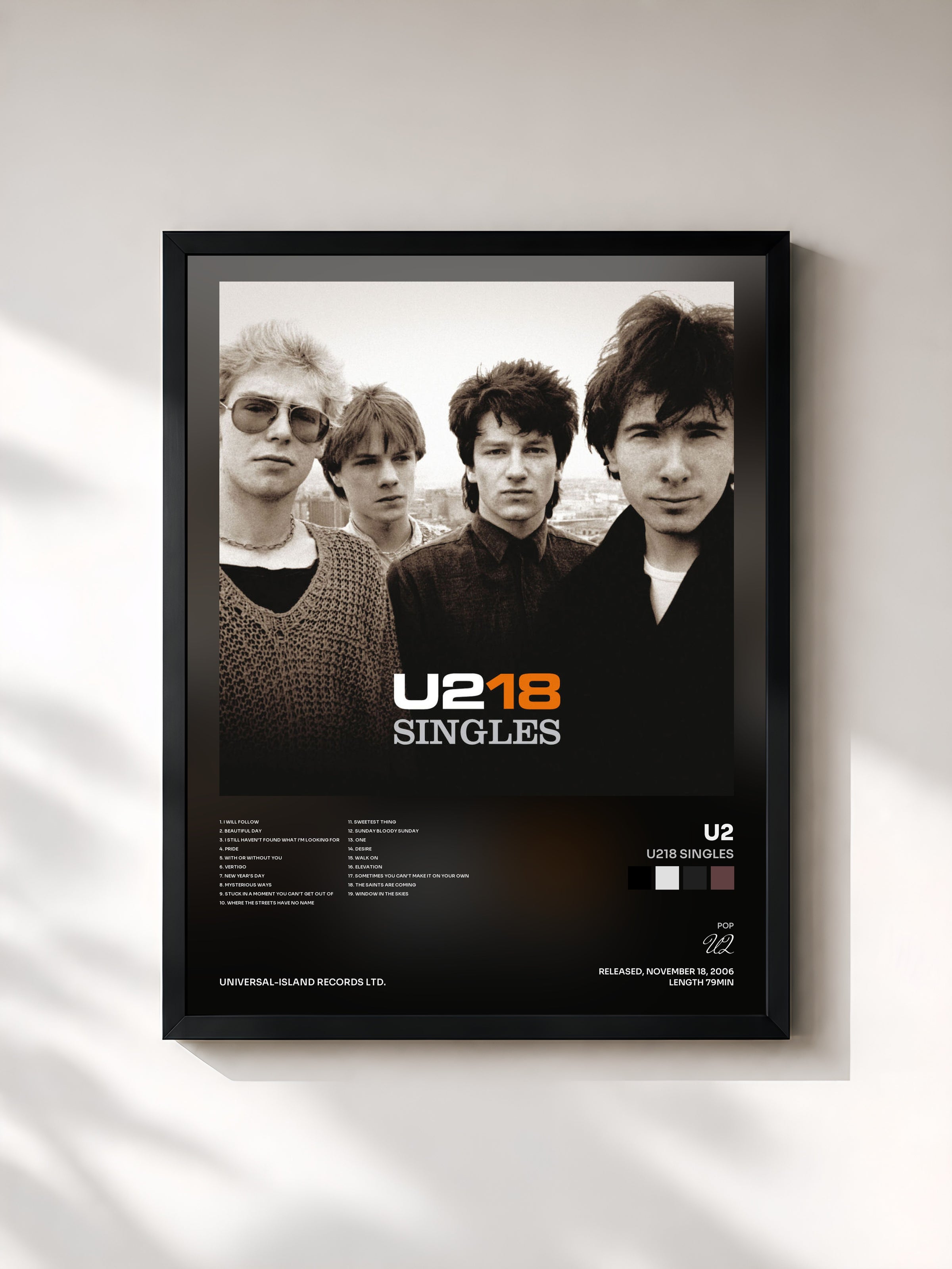 #noir U218 Singles de U2 en lámina enmarcada, marco negro, impresa y enmarcada en Francia