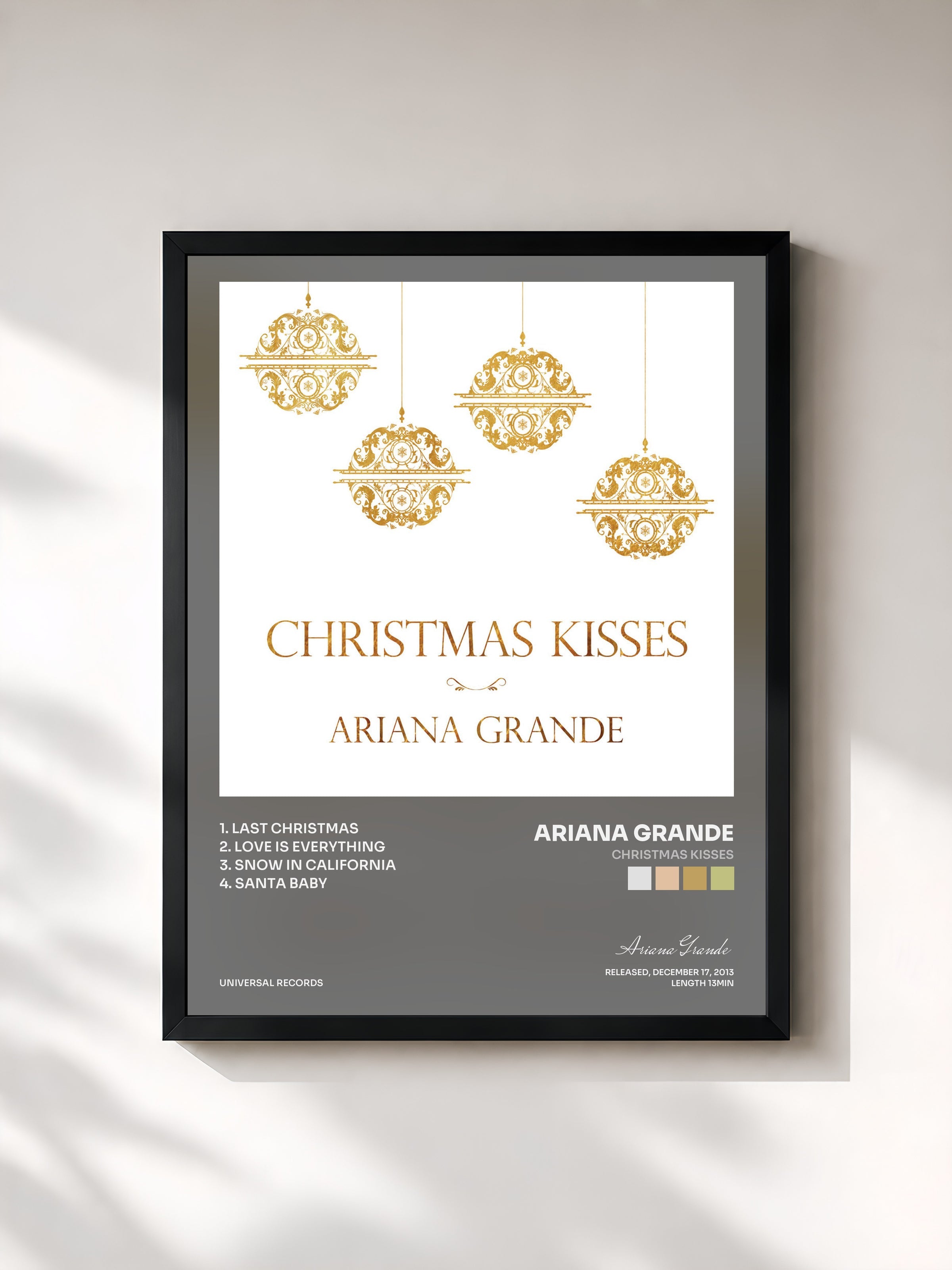 #noir Christmas Kisses by Ariana Grande as a framed art print, black frame, printed and framed in France