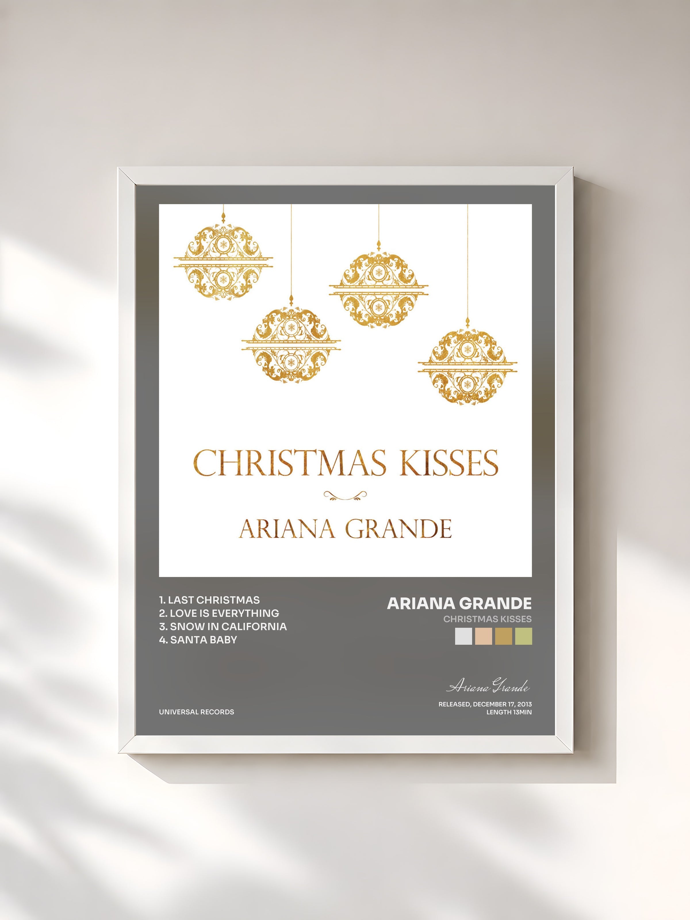 #blanc Christmas Kisses by Ariana Grande as a framed art print, white frame, printed and framed in France