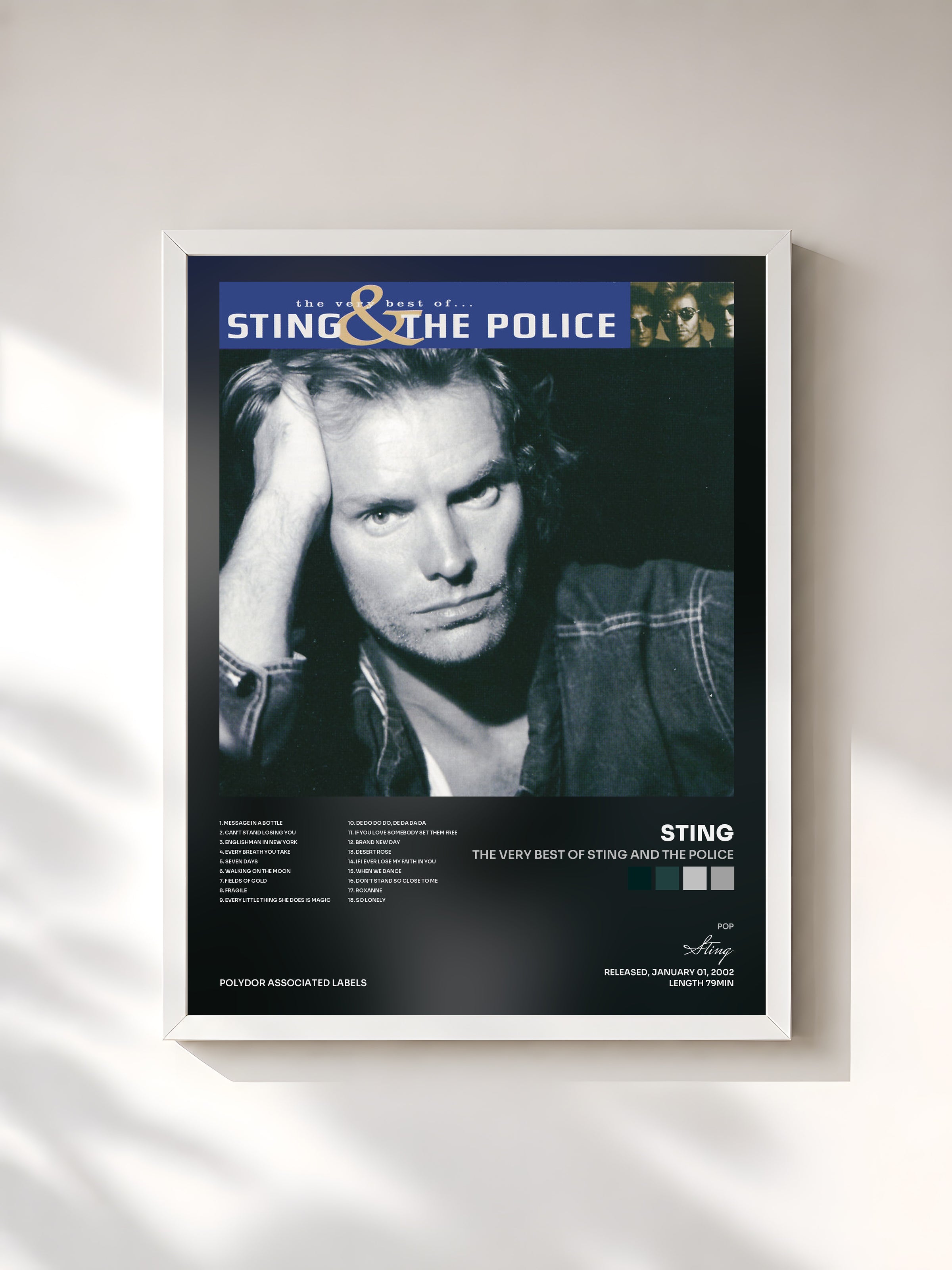 #blanc Tableau de l'album The Very Best Of Sting And The Police de Sting, cadre blanc, imprimé et encadré en France