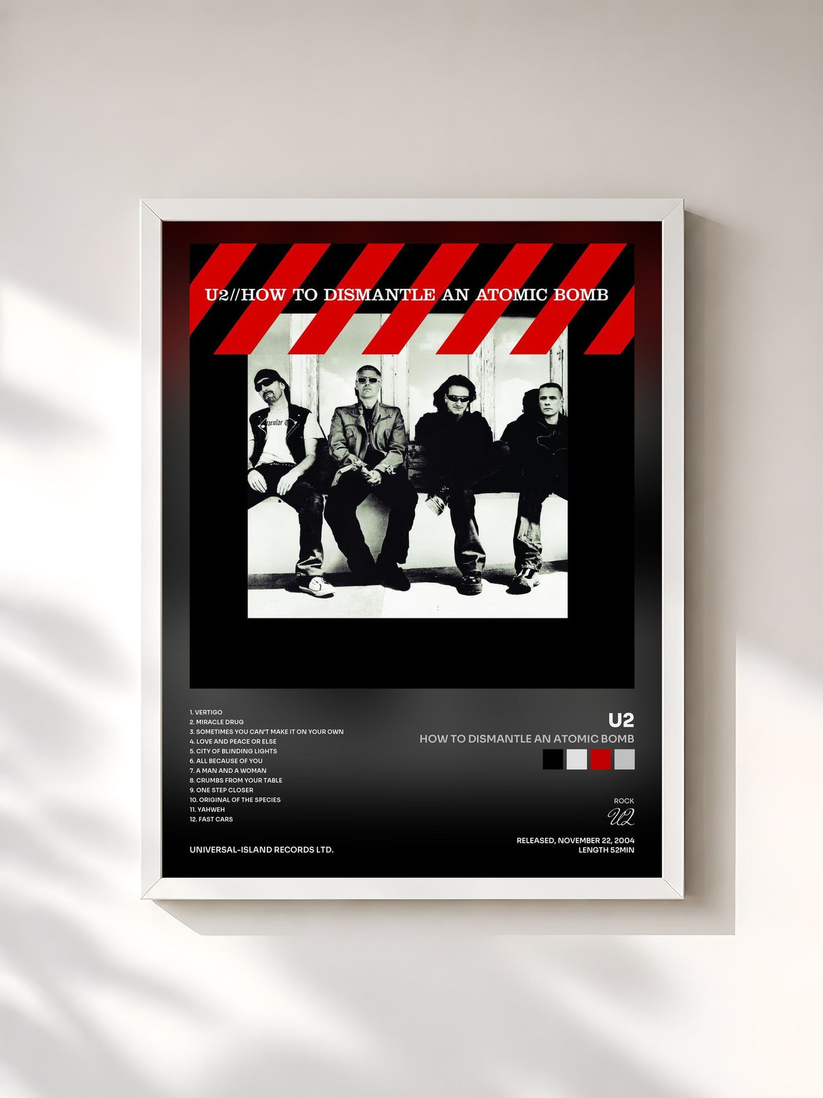 #blanc Tableau de l'album How To Dismantle An Atomic Bomb de U2, cadre blanc, imprimé et encadré en France