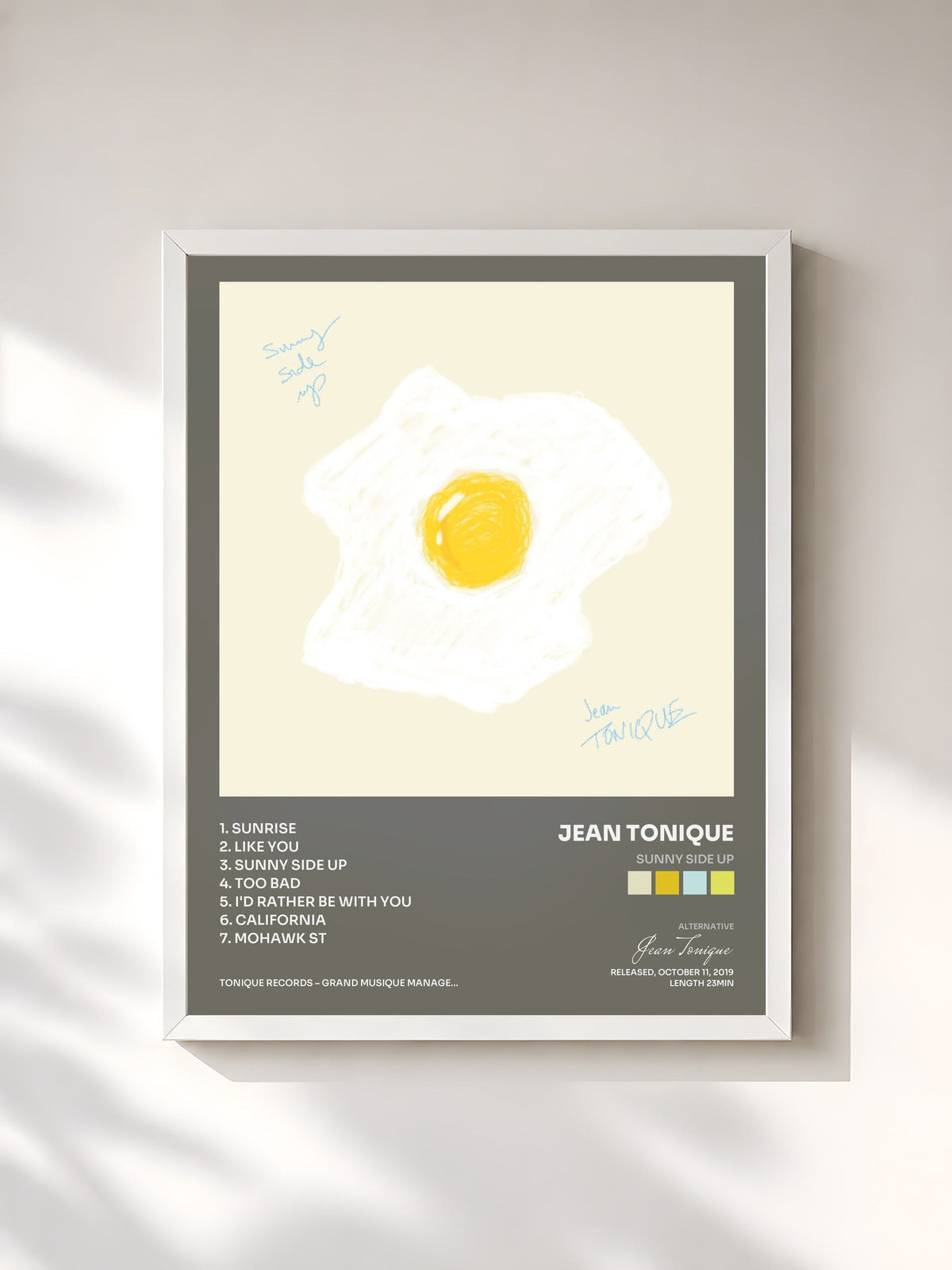 #blanc sunny side up by Jean Tonique as a framed art print, white frame, printed and framed in France