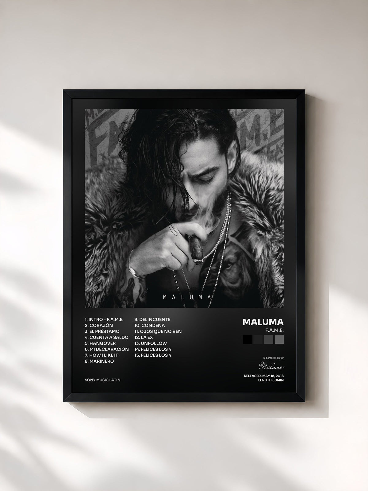 #noir Tableau de l'album F.A.M.E. de Maluma, cadre noir, imprimé et encadré en France