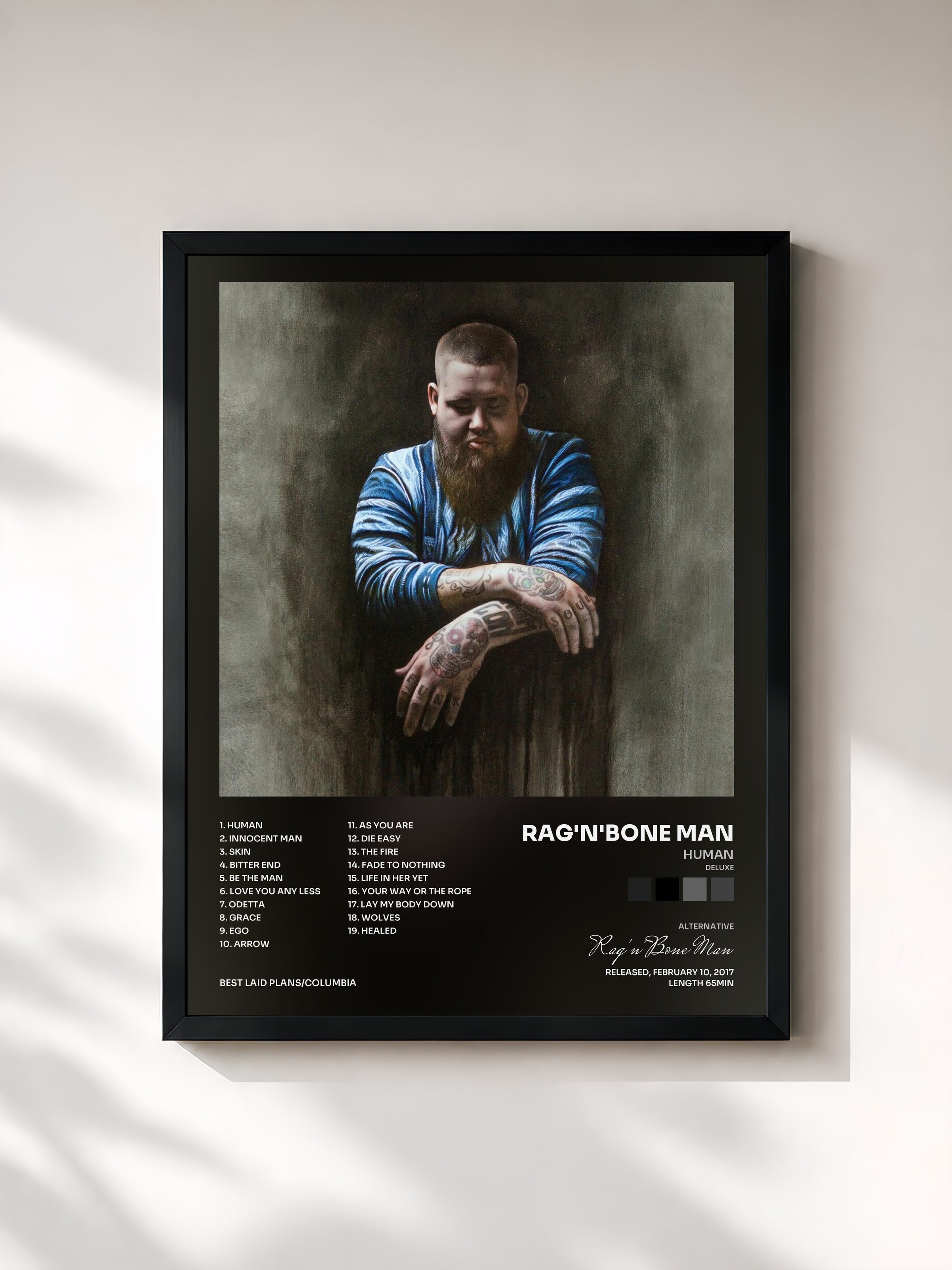 #noir Human (Deluxe) di Rag'n'Bone Man in stampa incorniciata, cornice nera, stampata e incorniciata in Francia