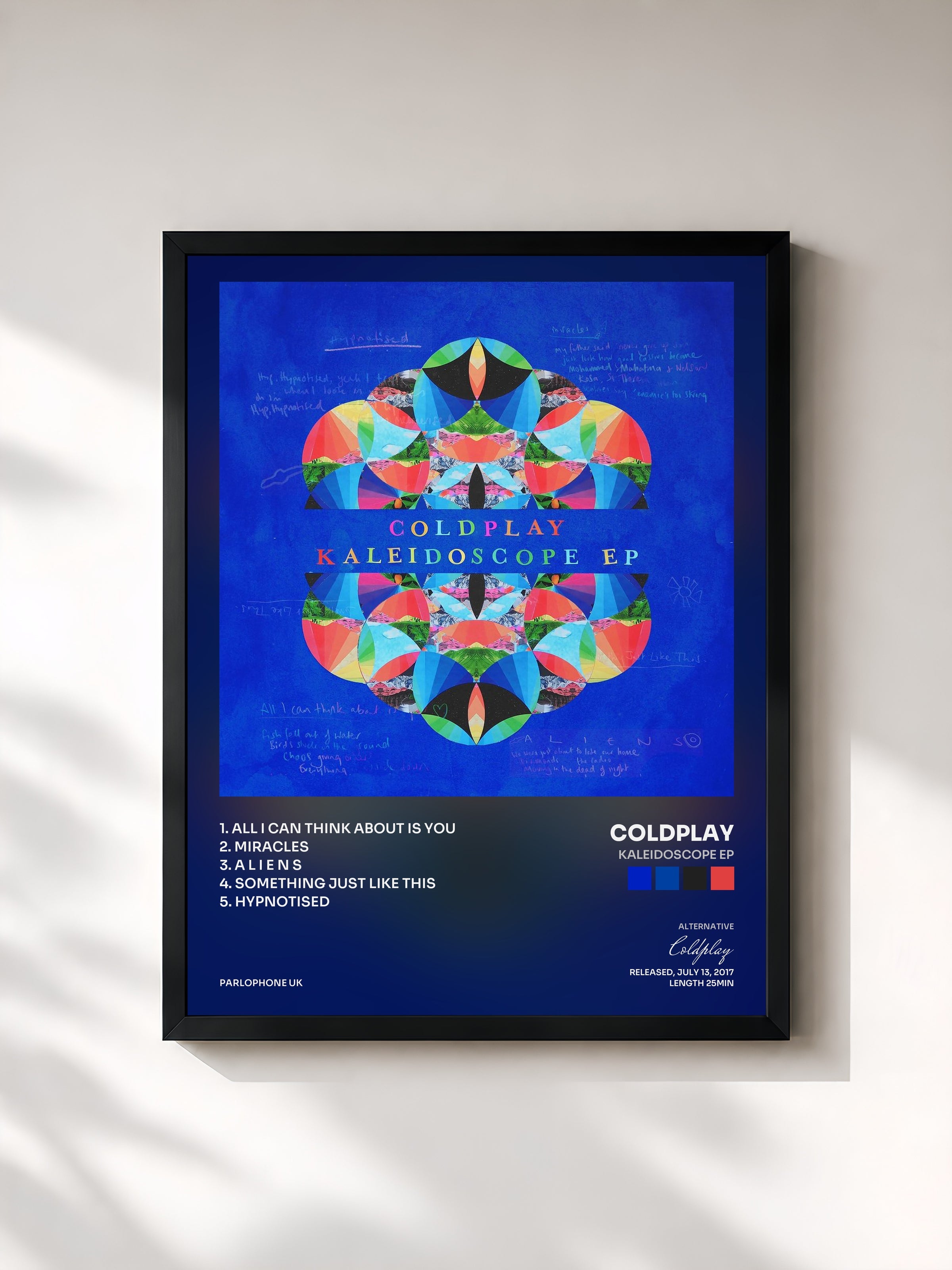 #noir Kaleidoscope EP de Coldplay en lámina enmarcada, marco negro, impresa y enmarcada en Francia