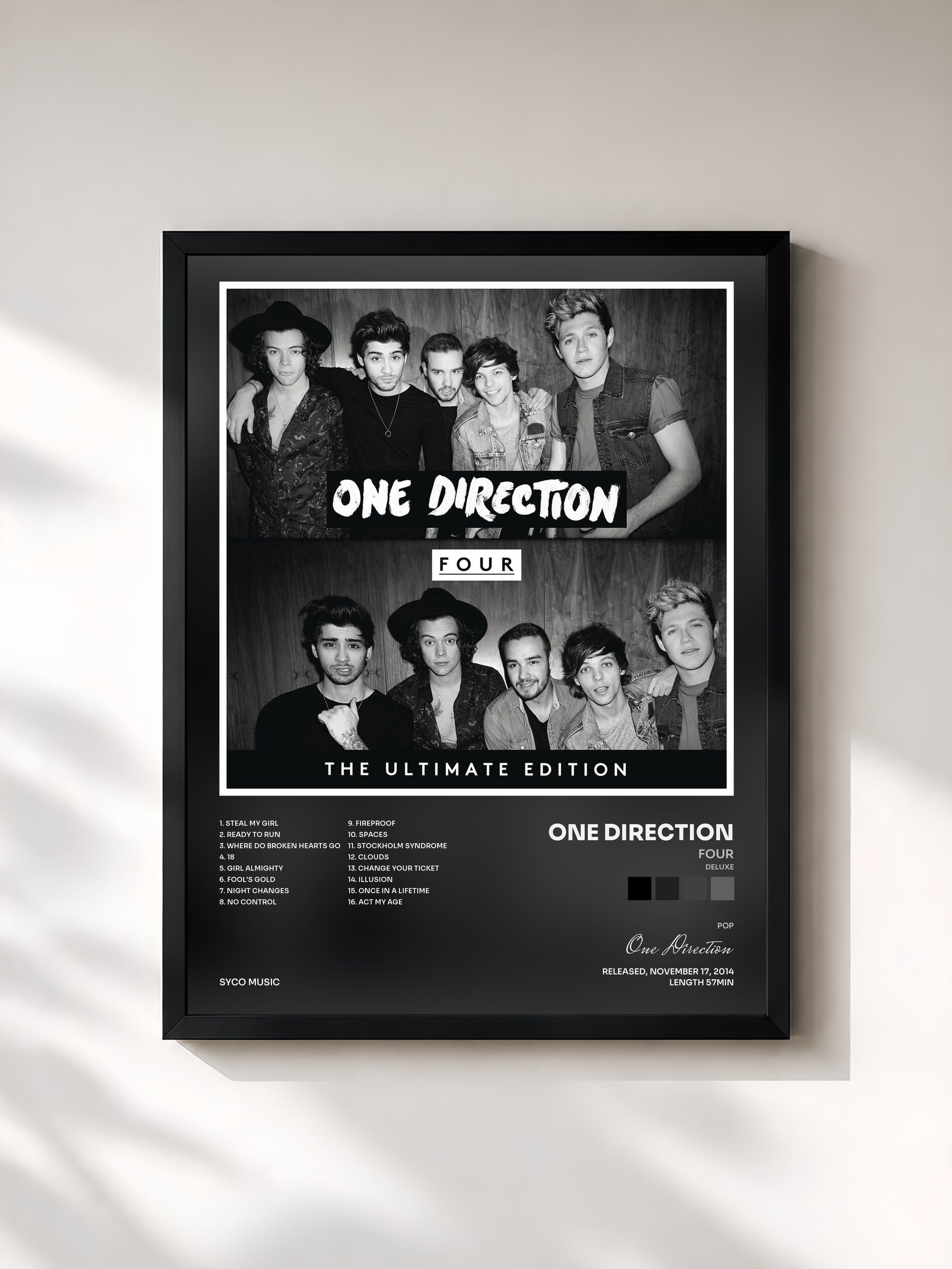 #noir FOUR (Deluxe) di One Direction in stampa incorniciata, cornice nera, stampata e incorniciata in Francia