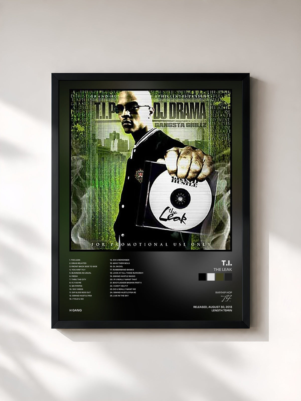 #noir The Leak by T.I. as a framed art print, black frame, printed and framed in France