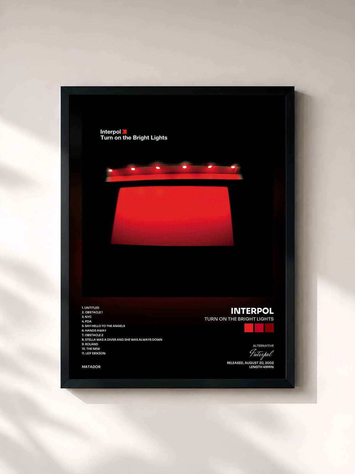 #noir Tableau de l'album Turn On The Bright Lights de Interpol, cadre noir, imprimé et encadré en France
