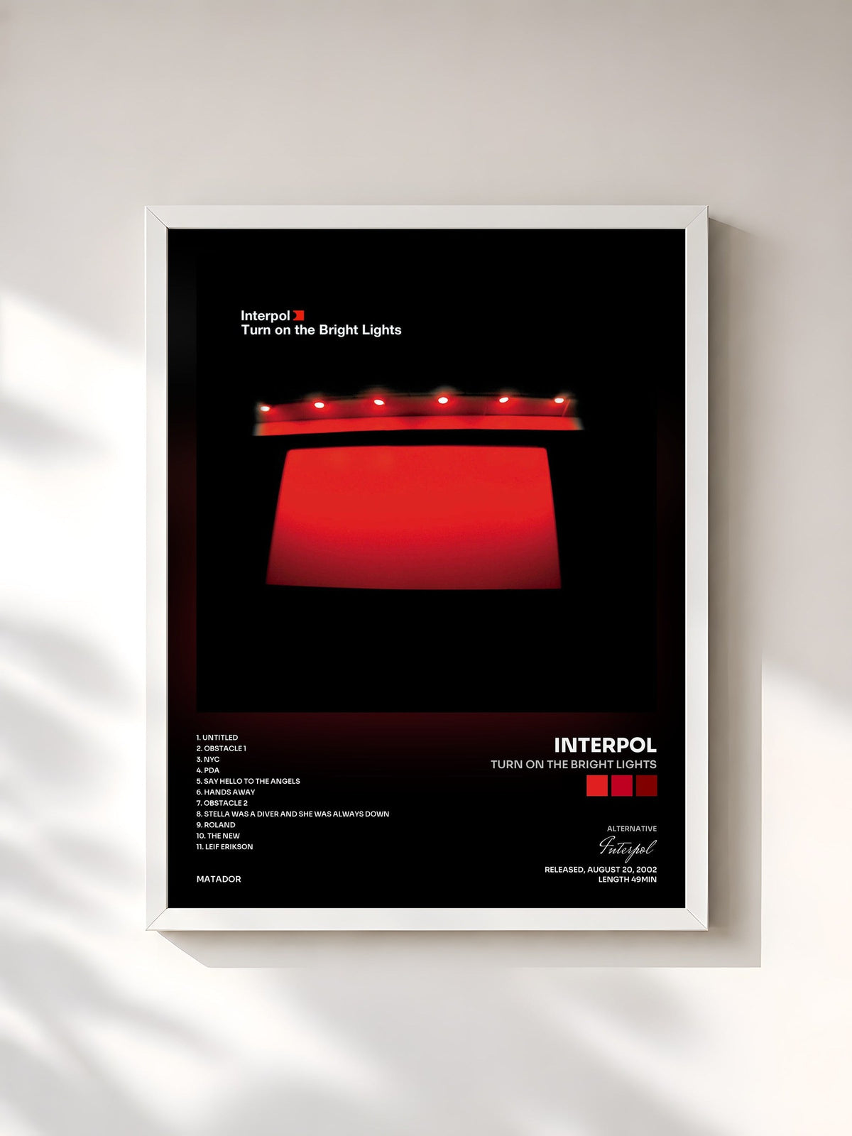 #blanc Tableau de l'album Turn On The Bright Lights de Interpol, cadre blanc, imprimé et encadré en France