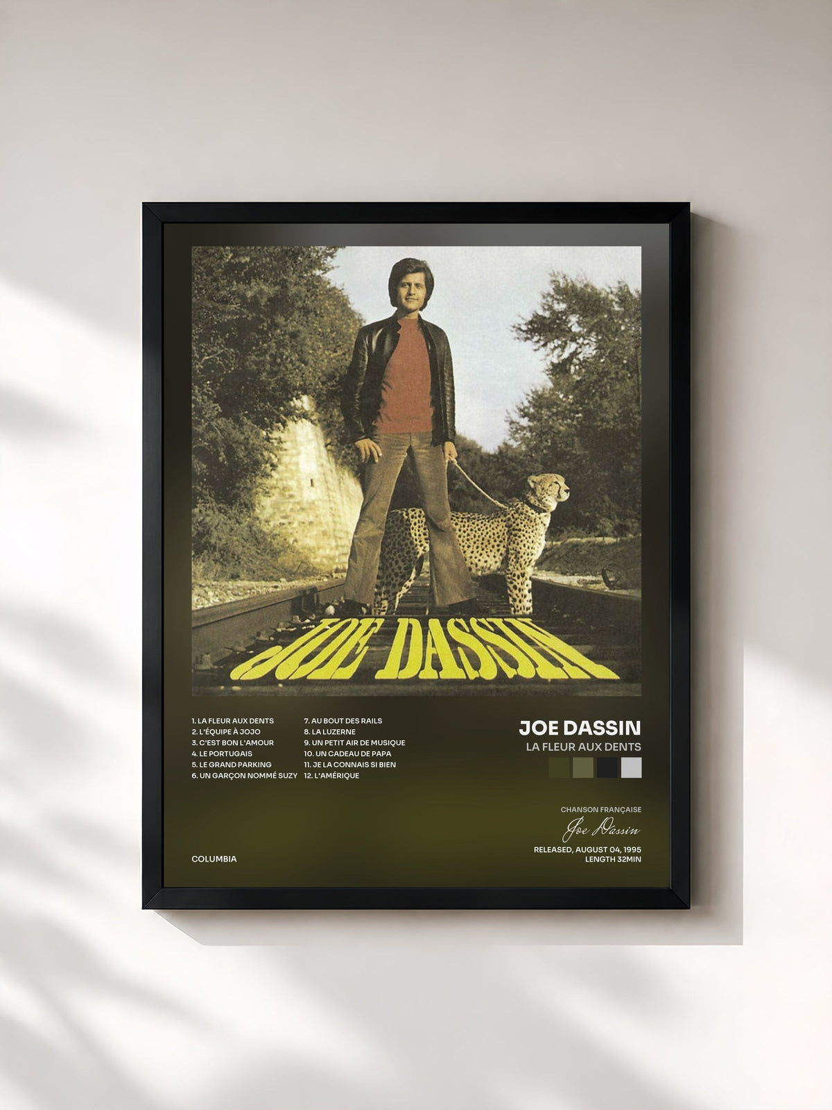 #noir La Fleur Aux Dents by Joe Dassin as a framed art print, black frame, printed and framed in France