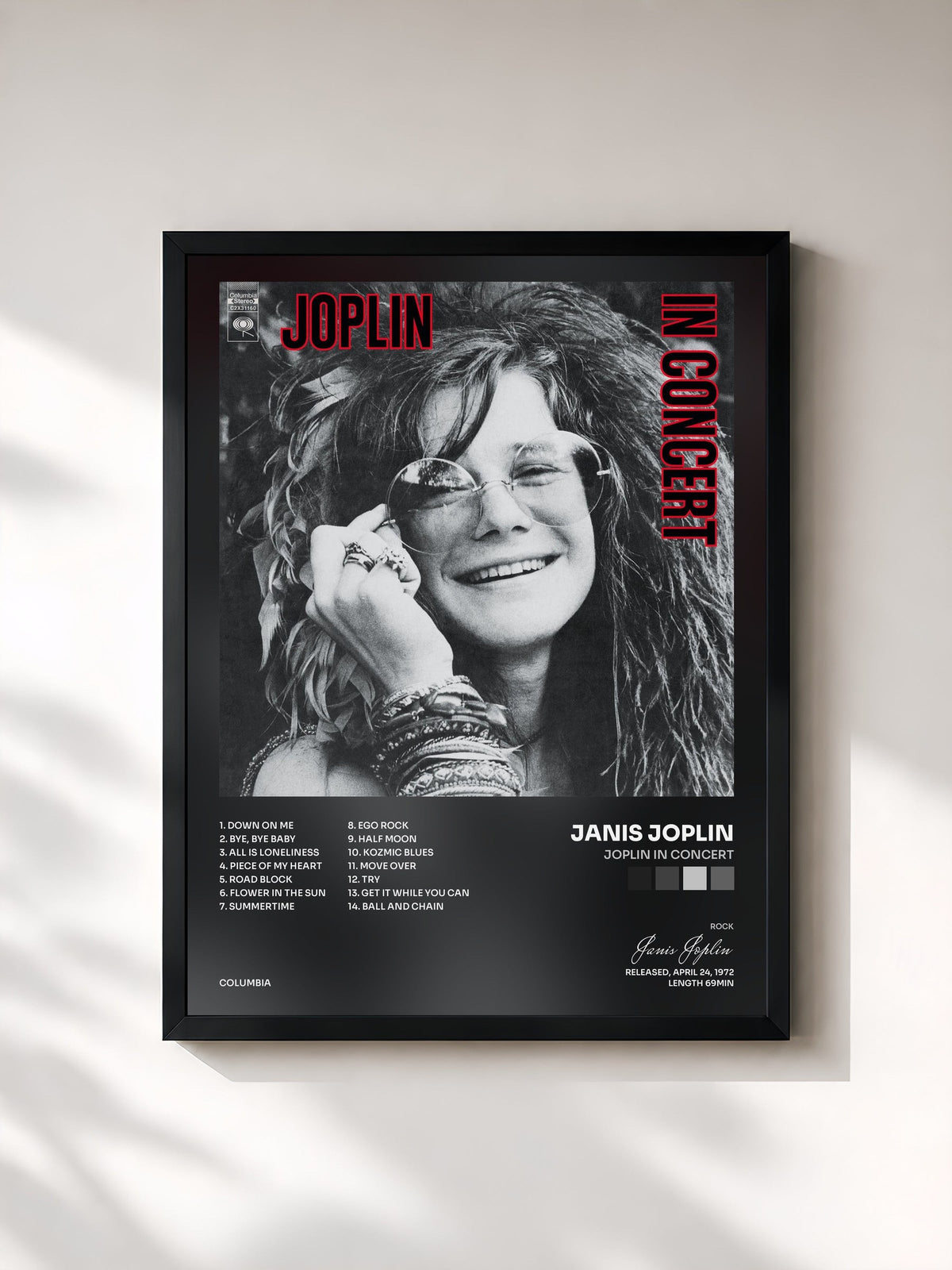 #noir Joplin In Concert by Janis Joplin as a framed art print, black frame, printed and framed in France