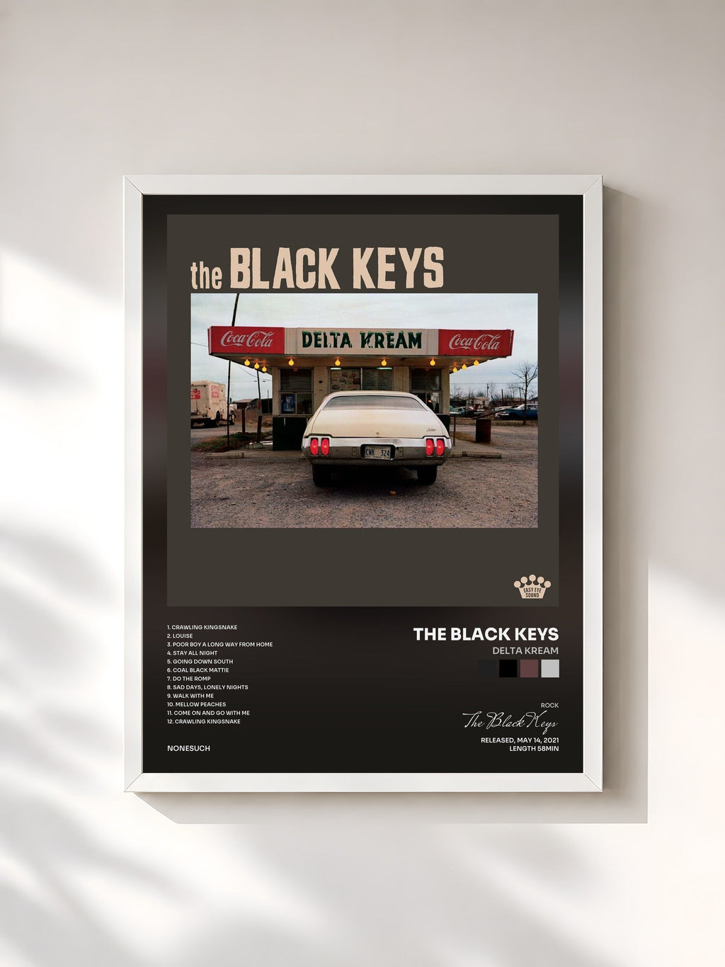 #blanc Delta Kream by The Black Keys as a framed art print, white frame, printed and framed in France