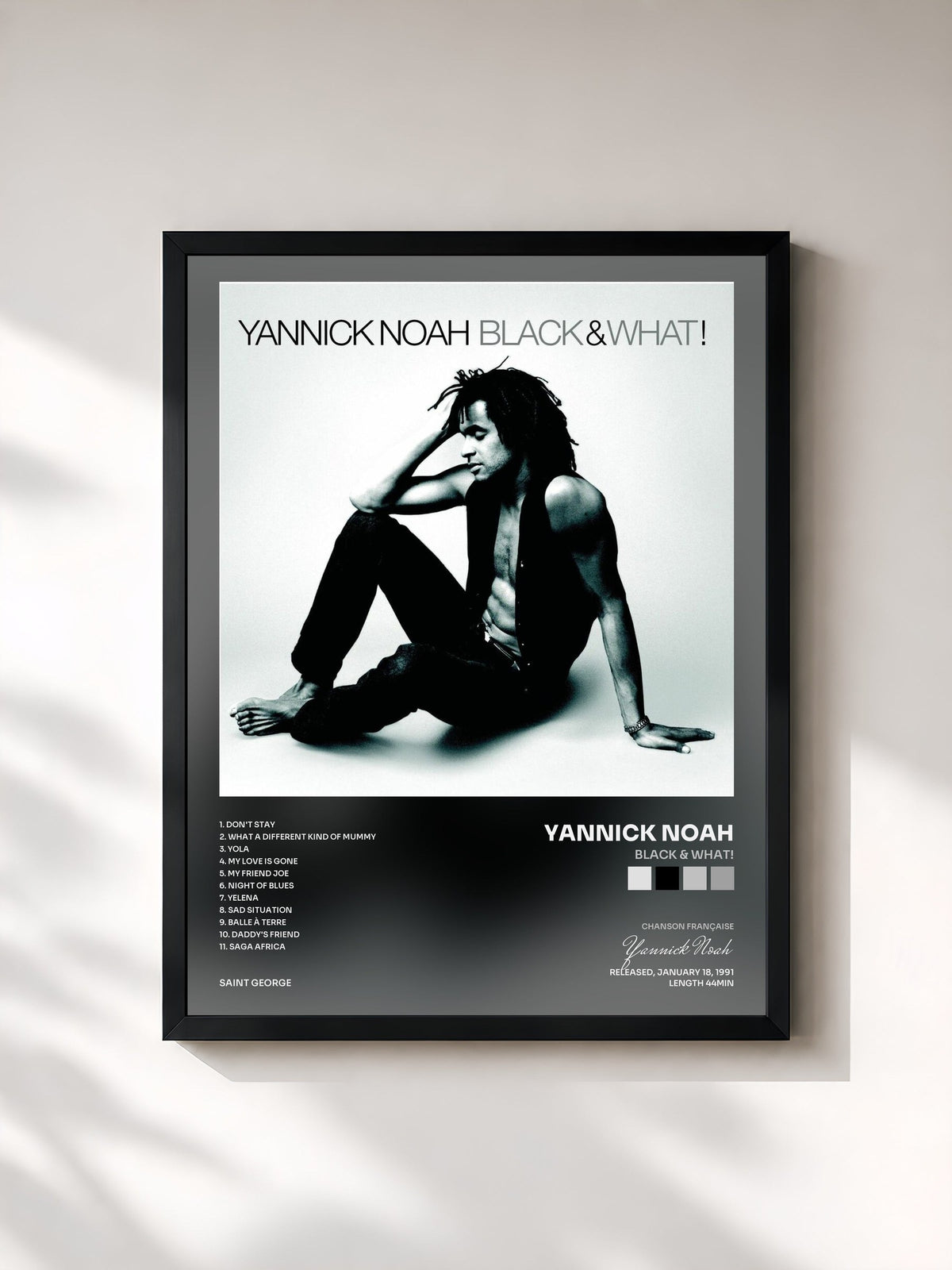 #noir Black & What! by Yannick Noah as a framed art print, black frame, printed and framed in France