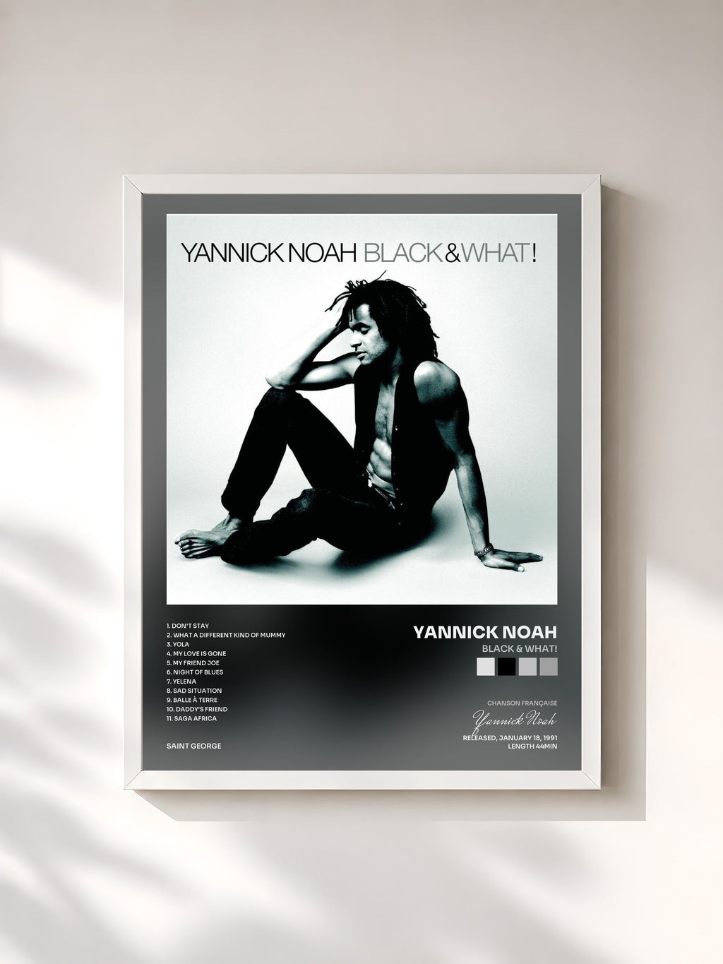 #blanc Black & What! de Yannick Noah en lámina enmarcada, marco blanco, impresa y enmarcada en Francia