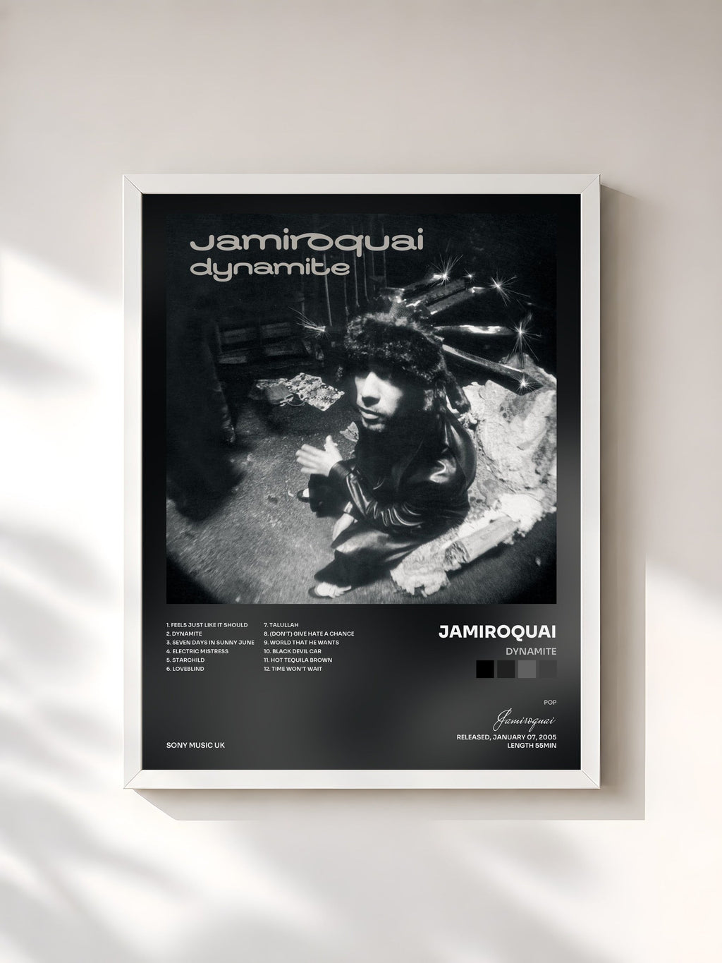 #blanc Dynamite de Jamiroquai en lámina enmarcada, marco blanco, impresa y enmarcada en Francia