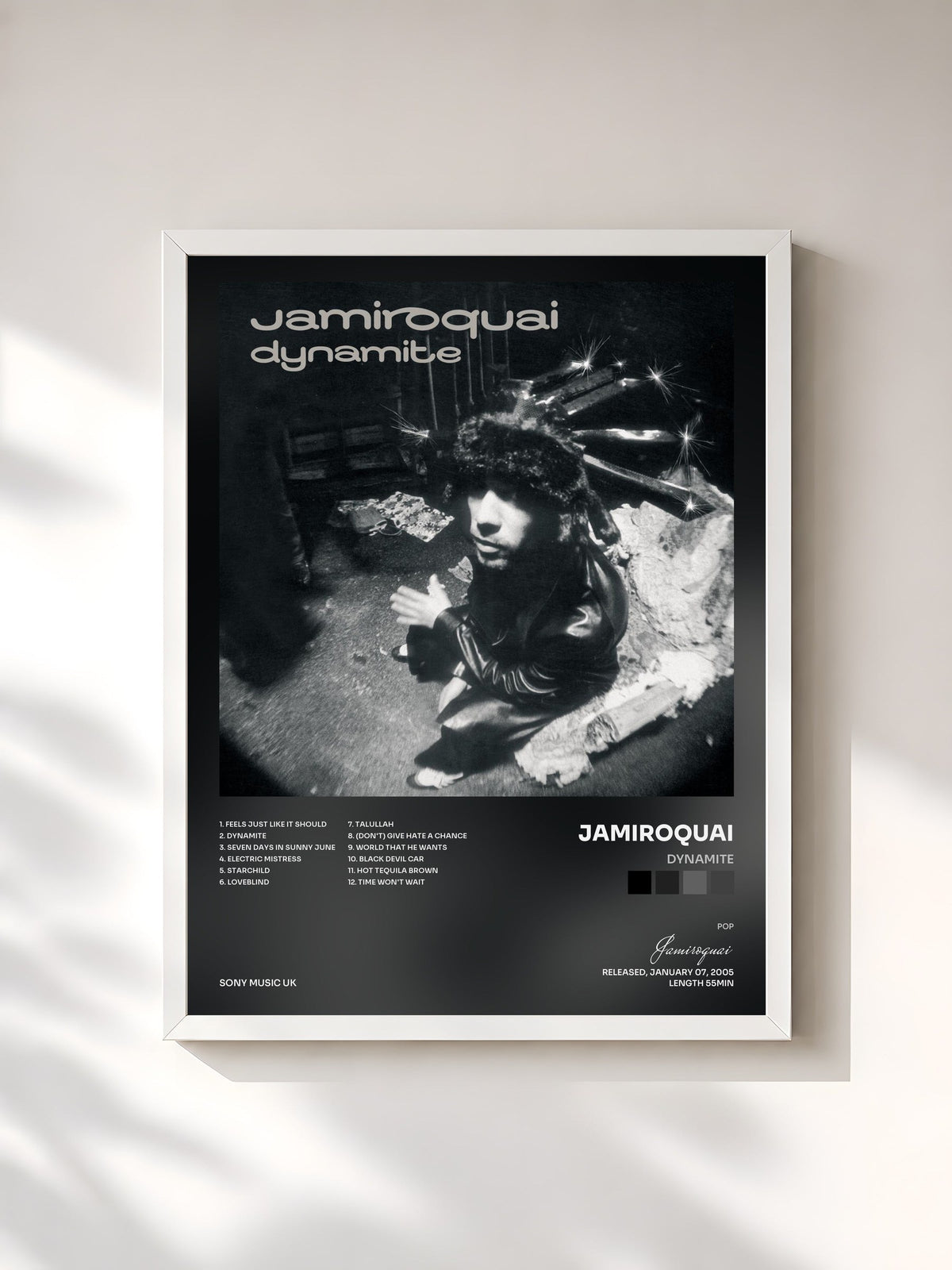 #blanc Dynamite de Jamiroquai en lámina enmarcada, marco blanco, impresa y enmarcada en Francia