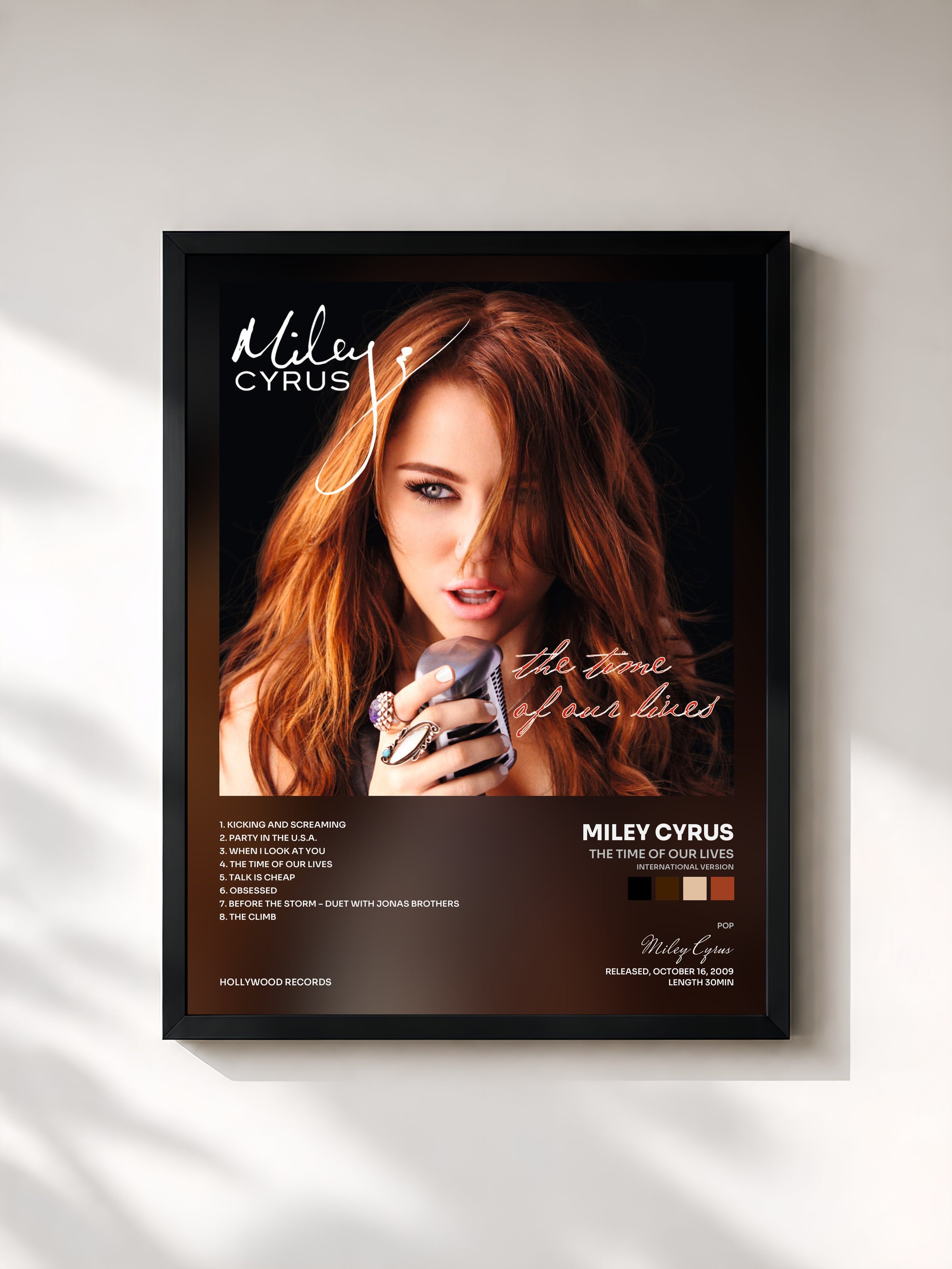 #noir The Time Of Our Lives (International Version) by Miley Cyrus as a framed art print, black frame, printed and framed in France