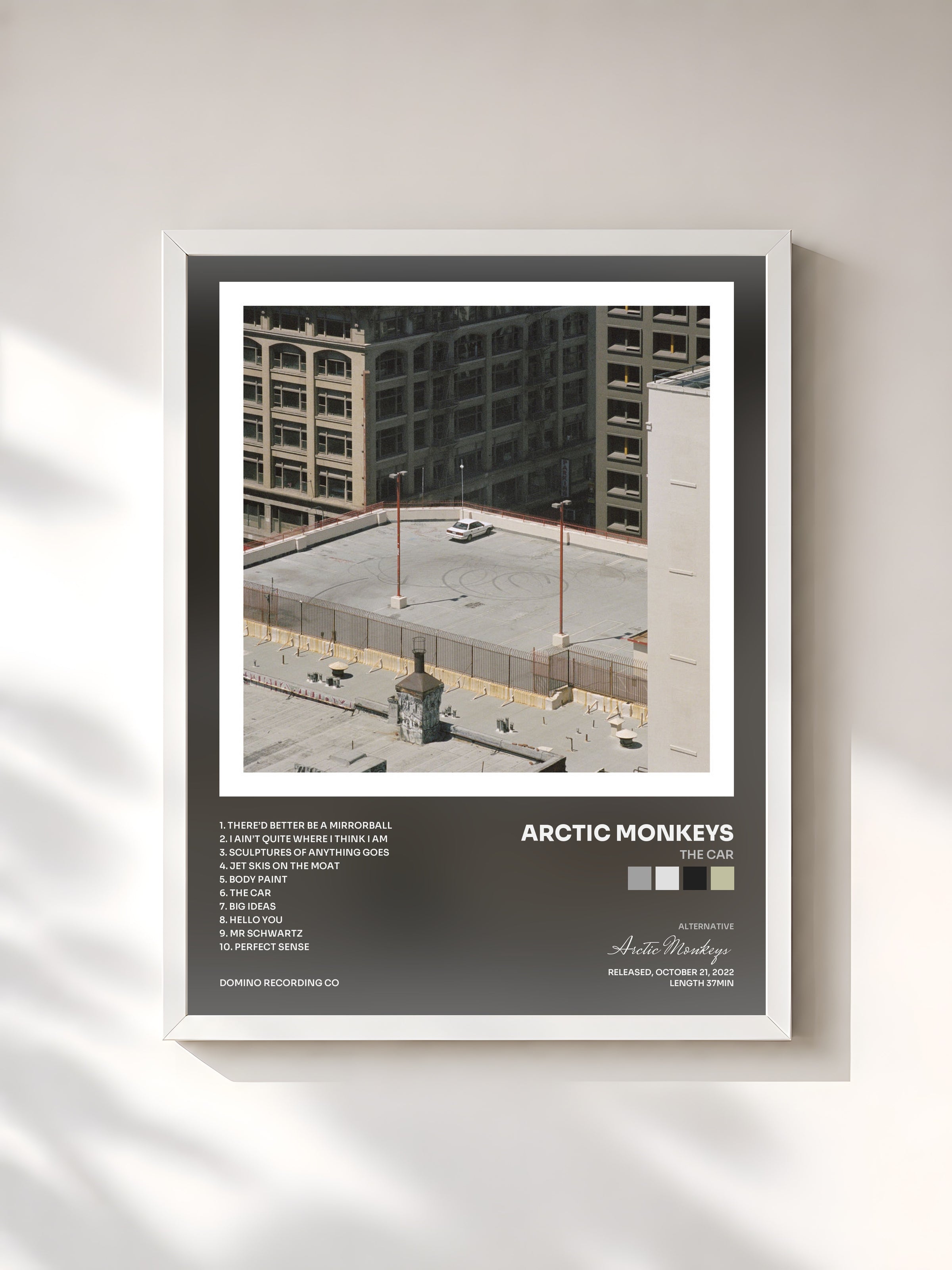 #blanc The Car by Arctic Monkeys as a framed art print, white frame, printed and framed in France