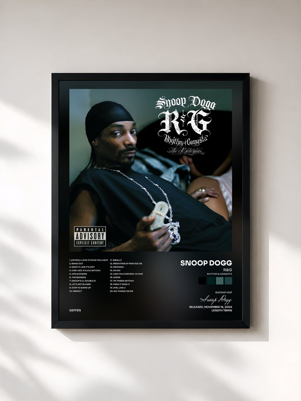 #noir R&G (Rhythm & Gangsta): The Masterpiece by Snoop Dogg as a framed art print, black frame, printed and framed in France